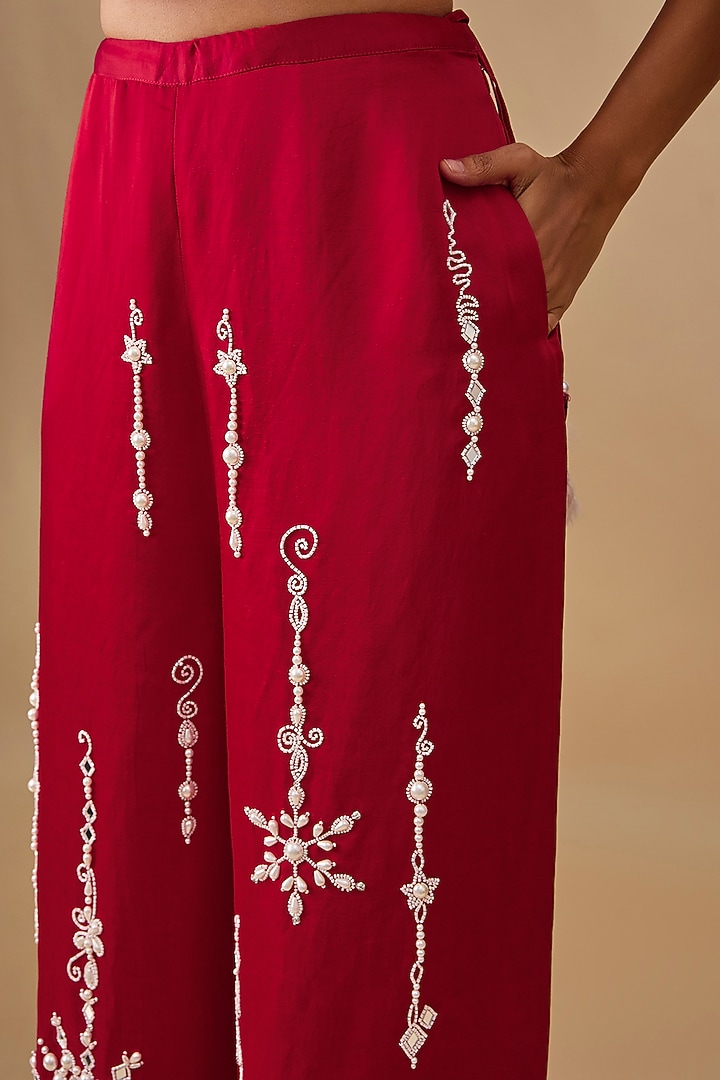 Red Blended Linen Moti Snowflake Work Trousers by Dilnaz Karbhary at Pernia's Pop Up Shop