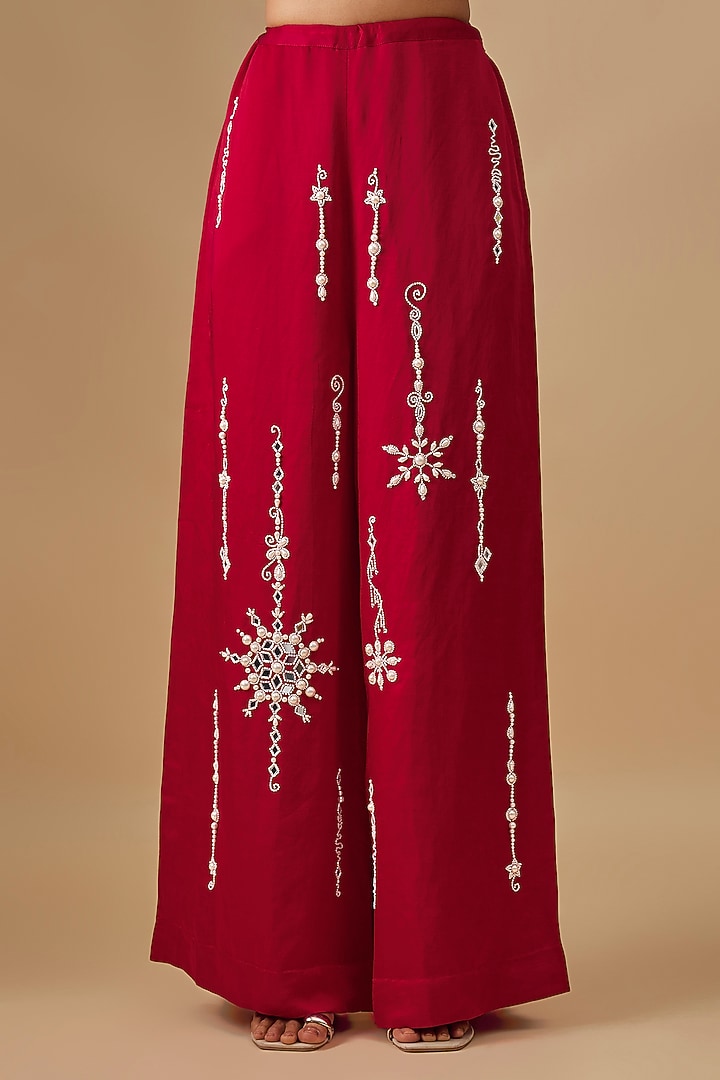 Red Blended Linen Moti Snowflake Work Trousers by Dilnaz Karbhary at Pernia's Pop Up Shop