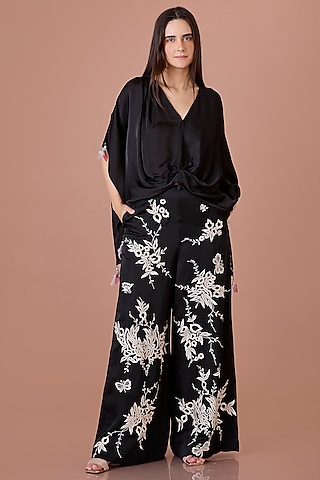 Black Blended Linen Parsi Gara Floral Embroidered Trousers by Dilnaz Karbhary