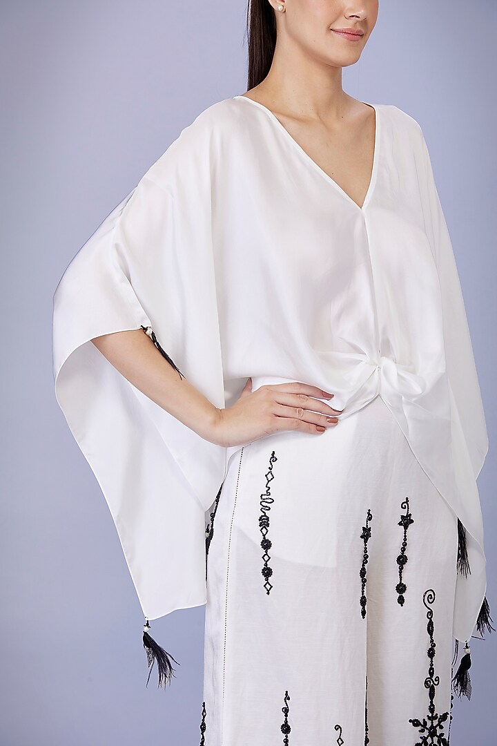 Ivory Blended Satin Linen Snowflakes Embroidered Trousers by Dilnaz Karbhary at Pernia's Pop Up Shop