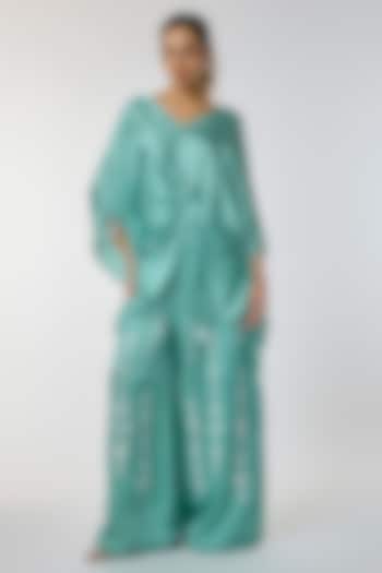 Jade Blue Blended Linen Mirror Work Trousers by Dilnaz Karbhary at Pernia's Pop Up Shop