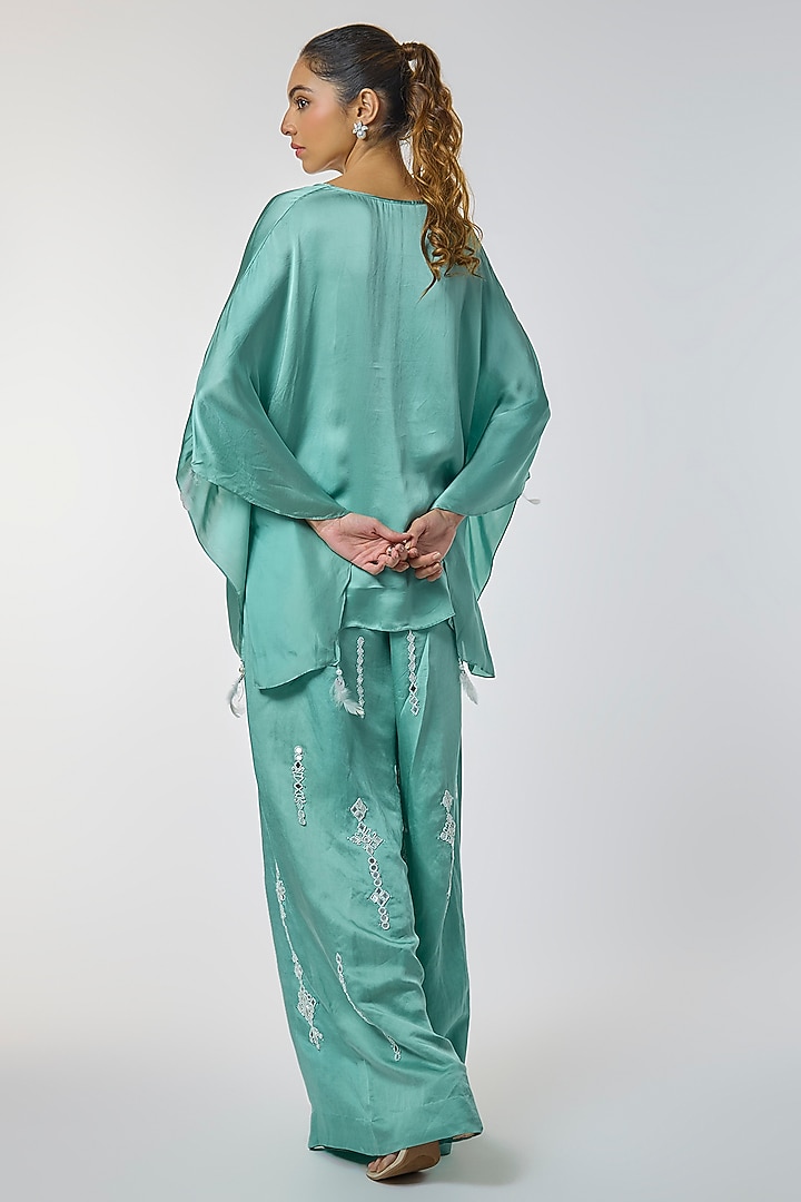 Jade Blue Blended Linen Mirror Work Trousers by Dilnaz Karbhary at Pernia's Pop Up Shop