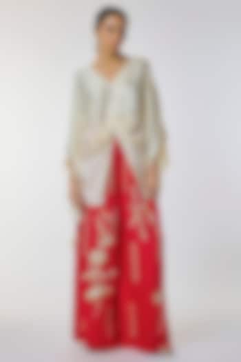 Red Blended Linen Floral Work Trousers by Dilnaz Karbhary at Pernia's Pop Up Shop