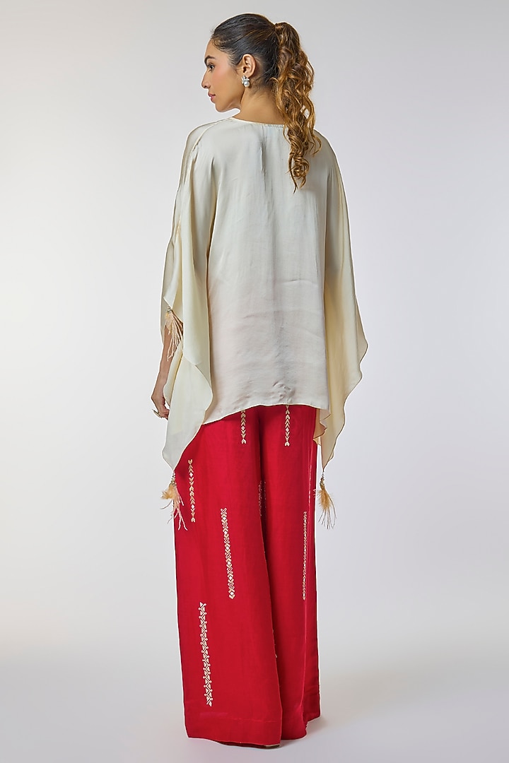 Red Blended Linen Floral Work Trousers by Dilnaz Karbhary at Pernia's Pop Up Shop