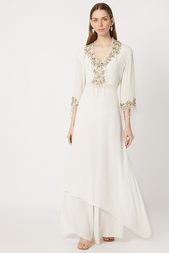 Ivory Embroidered Kurta With Flared Pants by Dilnaz Karbhary