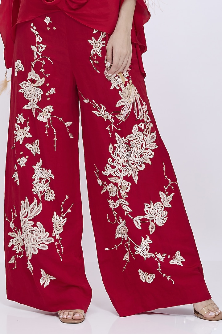 Red Blended Linen Chrysanthemum Machine Embroidered Trousers by Dilnaz Karbhary at Pernia's Pop Up Shop