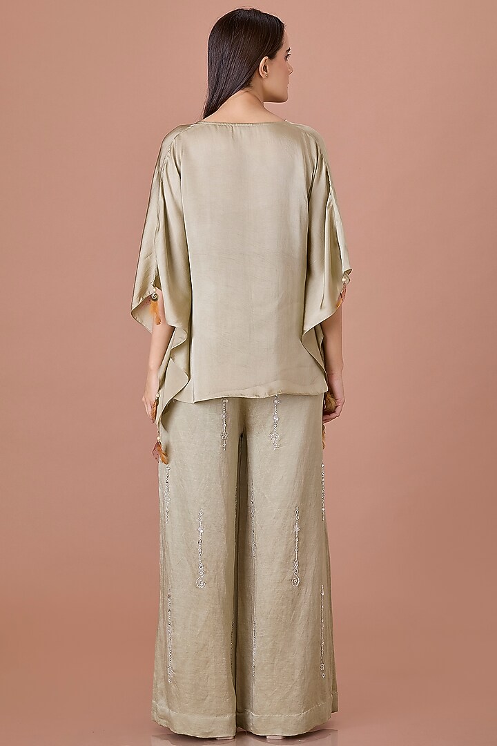 Sage Green Blended Linen Hand Embroidered Trousers by Dilnaz Karbhary at Pernia's Pop Up Shop