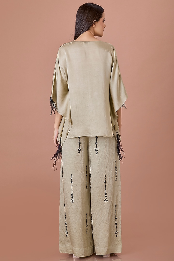 Sage Green Blended Linen Hand Embroidered Trousers by Dilnaz Karbhary at Pernia's Pop Up Shop