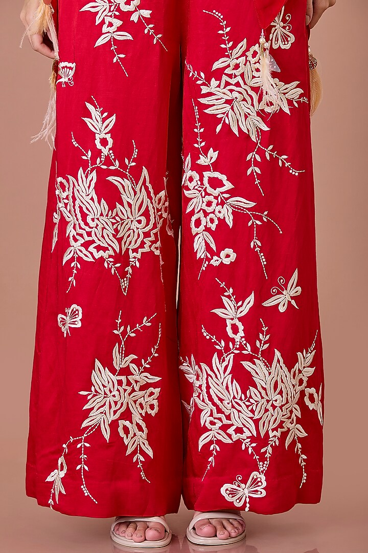 Red Blended Linen Machine Embroidered Trousers by Dilnaz Karbhary at Pernia's Pop Up Shop