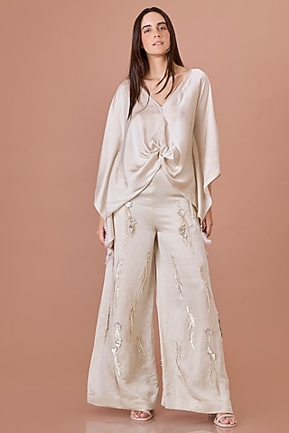Champagne Blended Linen Hand Embroidered Trousers by Dilnaz Karbhary