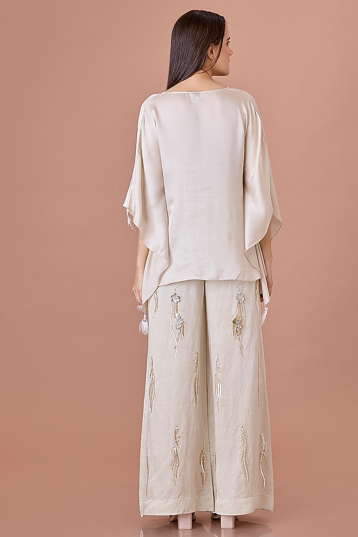 Champagne Blended Linen Hand Embroidered Trousers by Dilnaz Karbhary at Pernia's Pop Up Shop