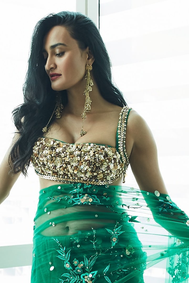 Emerald Green Net & Polyester Satin Sequins Hand Embroidered Blouse by Dilnaz Karbhary at Pernia's Pop Up Shop