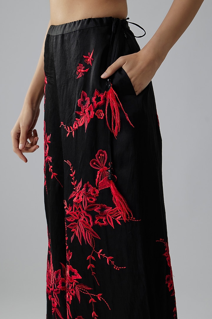 Black Satin Floral Machine Embroidered Trousers by Dilnaz Karbhary at Pernia's Pop Up Shop