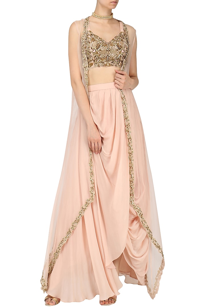 Rose Pink Drape Skirt with Embroidered Blouse and Cape by Nitika Kanodia Gupta