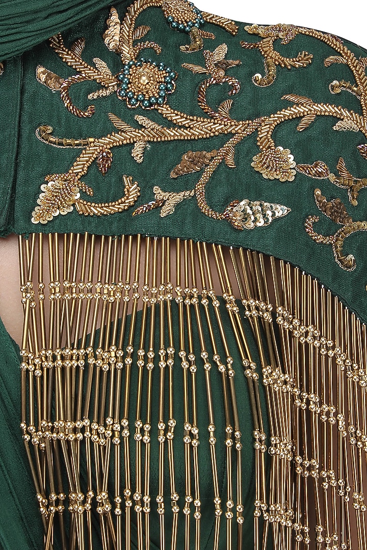 Bottle green drape saree with embroidered cape available only at Pernia's Pop Up Shop.