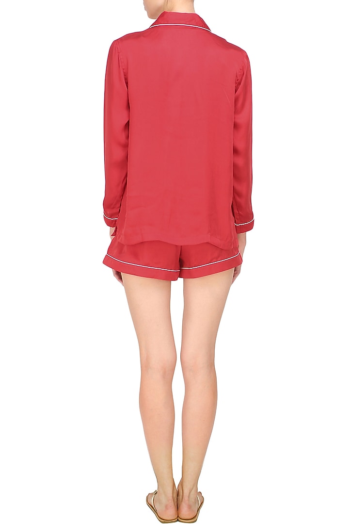 Red satin shirt and shorts set available only at Pernia's Pop Up Shop.