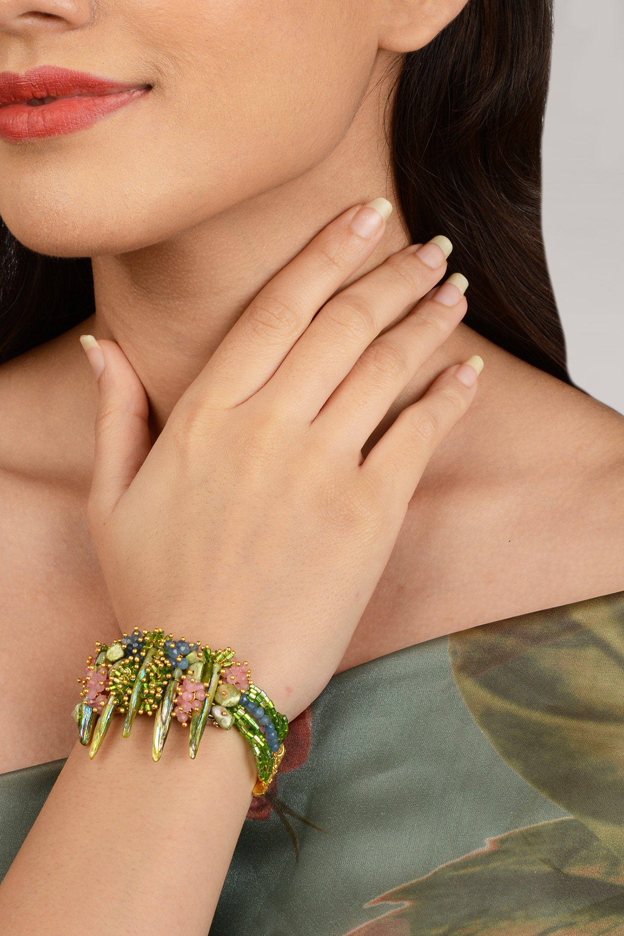 Gold Finish Crystal Beaded Shell Bracelet by House of D'oro at Pernia's Pop Up Shop
