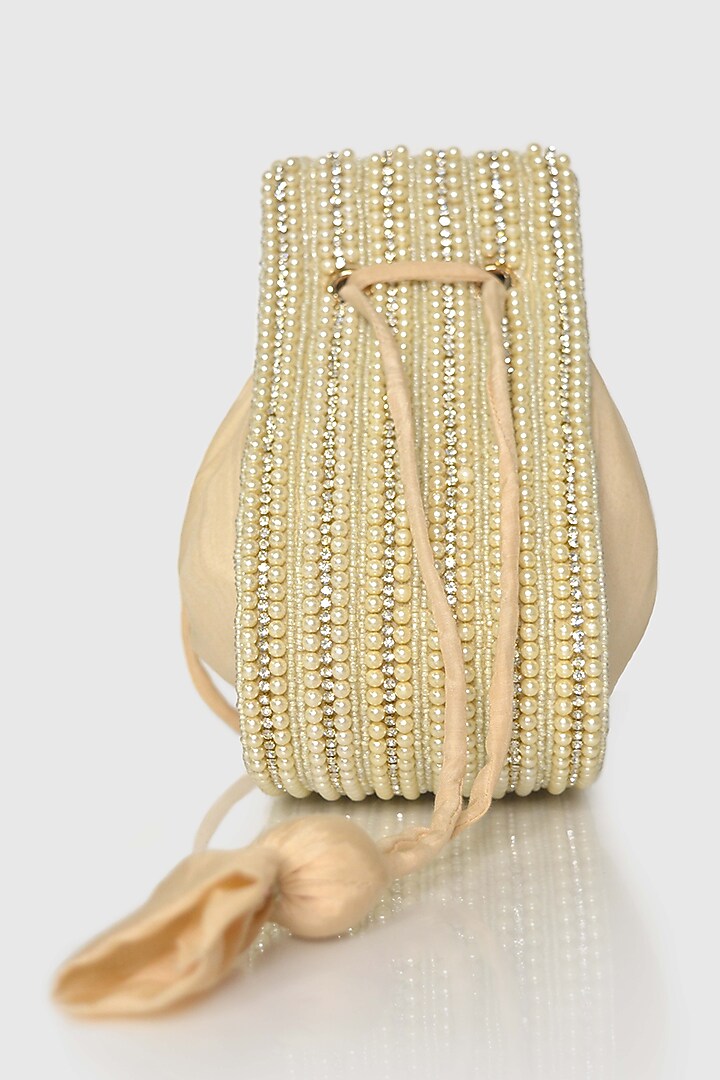 Beige Raw Silk Embellished Modak Potli by House of D'oro at Pernia's Pop Up Shop