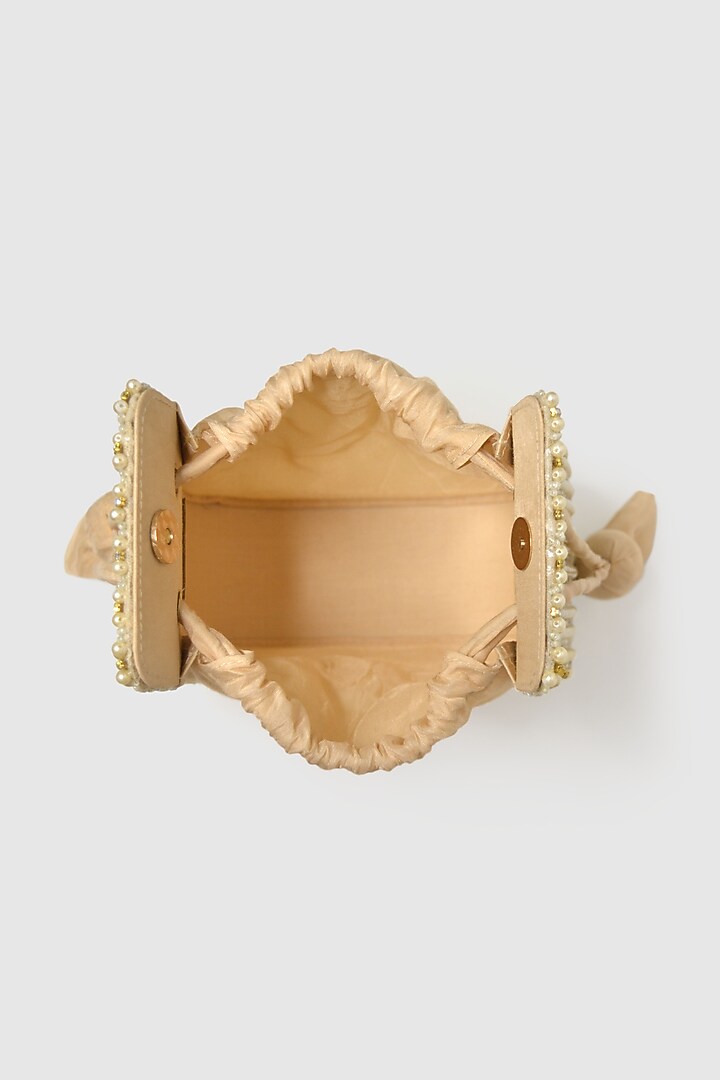 Beige Raw Silk Embellished Modak Potli by House of D'oro at Pernia's Pop Up Shop