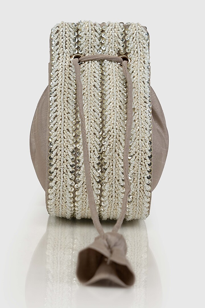 Ivory Raw Silk Embellished Modak Potli by House of D'oro at Pernia's Pop Up Shop
