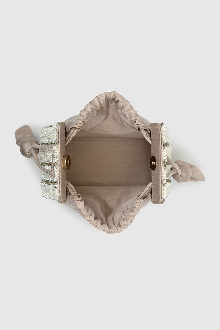 Ivory Raw Silk Embellished Modak Potli by House of D'oro at Pernia's Pop Up Shop