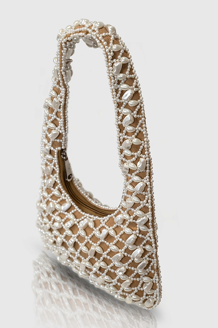 Tan Denim Pearl Embellished Hobo Bag by House of D'oro at Pernia's Pop Up Shop