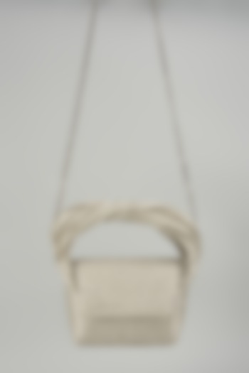 Silver Faux Leather Corded Flap Bag by Doux Amour at Pernia's Pop Up Shop