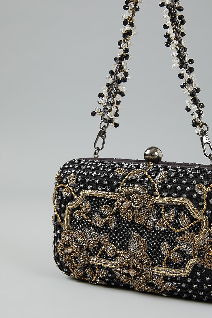Black Faux Suede Embellished Clutch Bag by Doux Amour at Pernia's Pop Up Shop