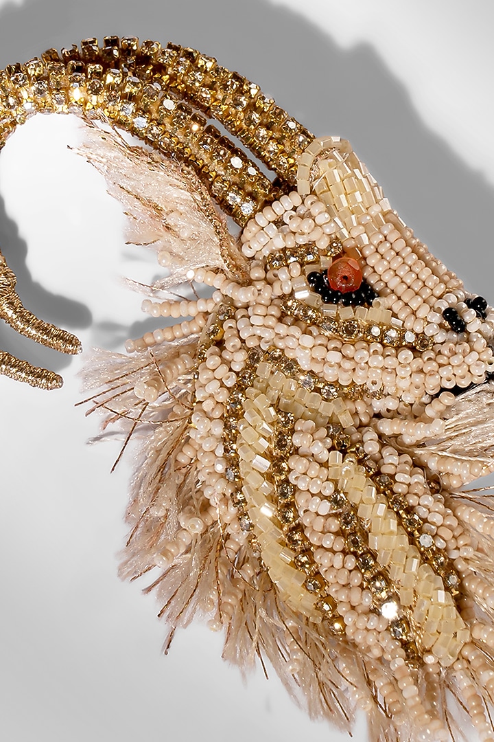 Beige Glass Beaded & Metallic Thread Ram Brooch by Deepa Gurnani at Pernia's Pop Up Shop