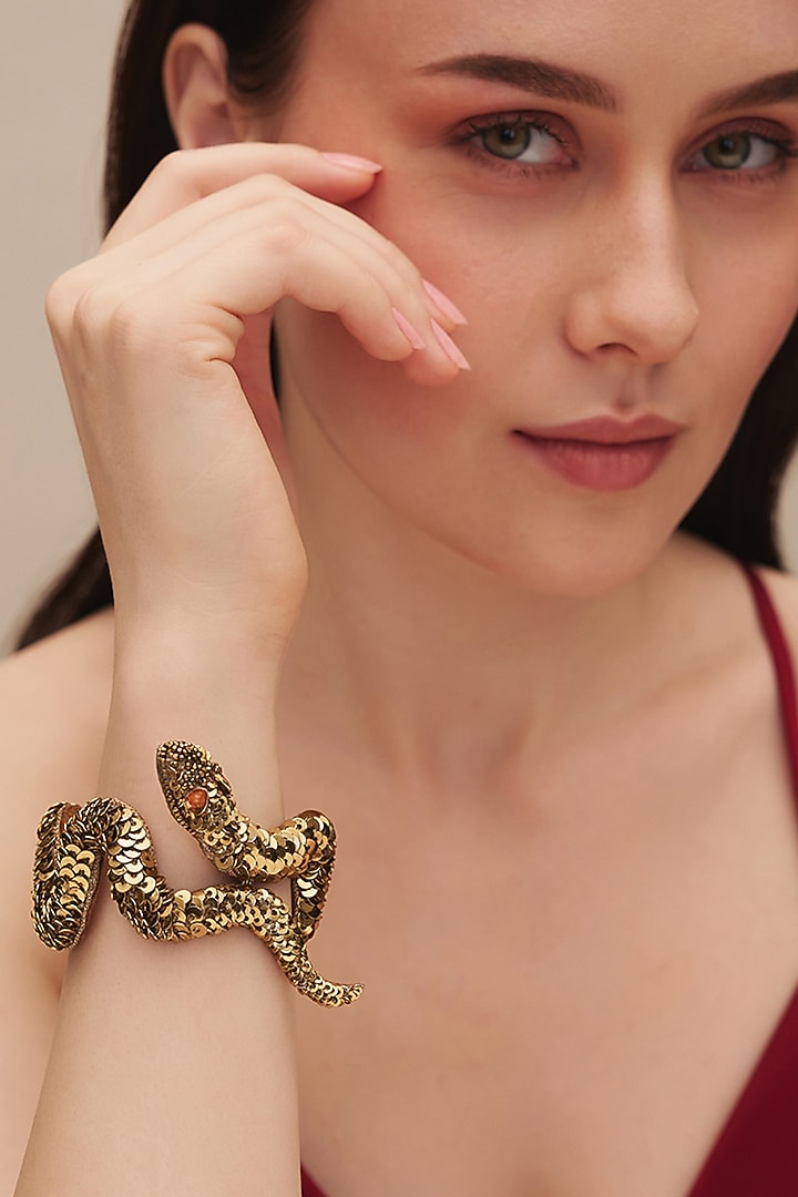 Gold Finish Glass Beaded Nagini Bracelet by Deepa Gurnani at Pernia's Pop Up Shop
