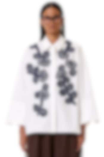 White Cotton Floral Embroidered Oversized Polo Shirt by Dhruv Kapoor at Pernia's Pop Up Shop