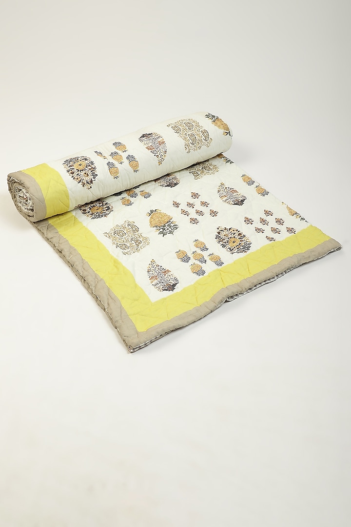 Yellow Printed Kashmiri Booti Single Bed Quilt by Ritu Kumar Home
