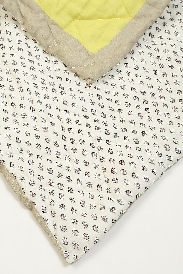 Yellow Printed Kashmiri Booti Single Bed Quilt by Ritu Kumar Home at Pernia's Pop Up Shop