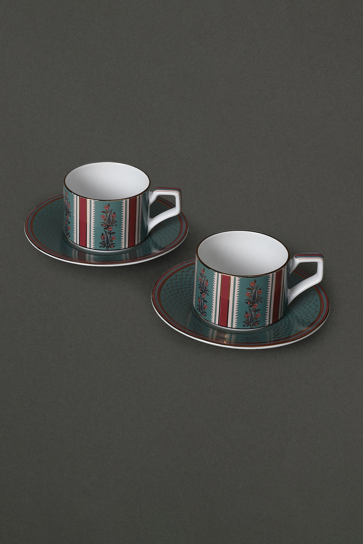 Ecru & Red Flora Cup And Saucer Set (Set Of 2) by Ritu Kumar Home at Pernia's Pop Up Shop