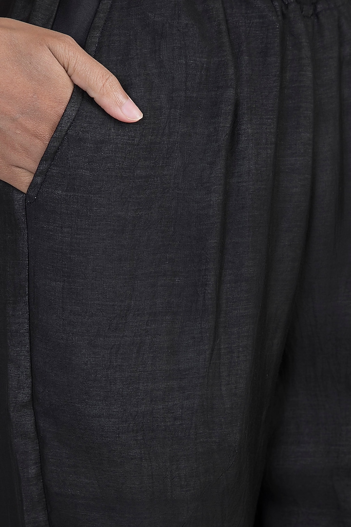 Black Elasticated Pants by DOOR OF MAAI at Pernia's Pop Up Shop