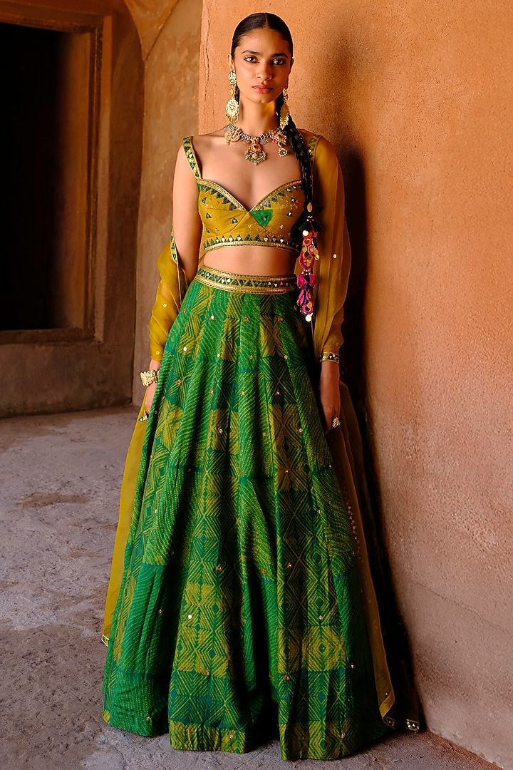 Green Dupion Silk Mirror Hand Embroidered Wedding Lehenga Set by Drishti & Zahabia at Pernia's Pop Up Shop