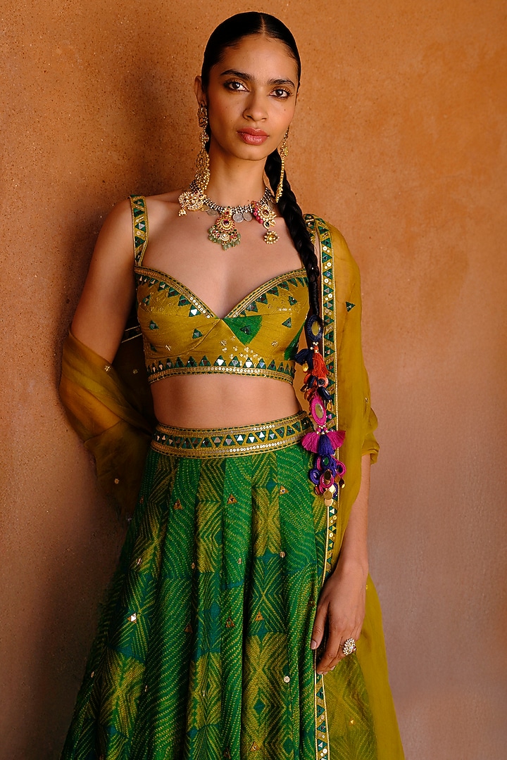 Green Dupion Silk Mirror Hand Embroidered Wedding Lehenga Set by Drishti & Zahabia at Pernia's Pop Up Shop