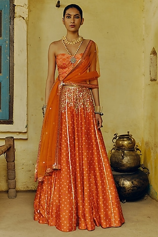 Rust Dupion Silk Bandhani Printed & Hand Embroidered Lehenga Set by Drishti & Zahabia