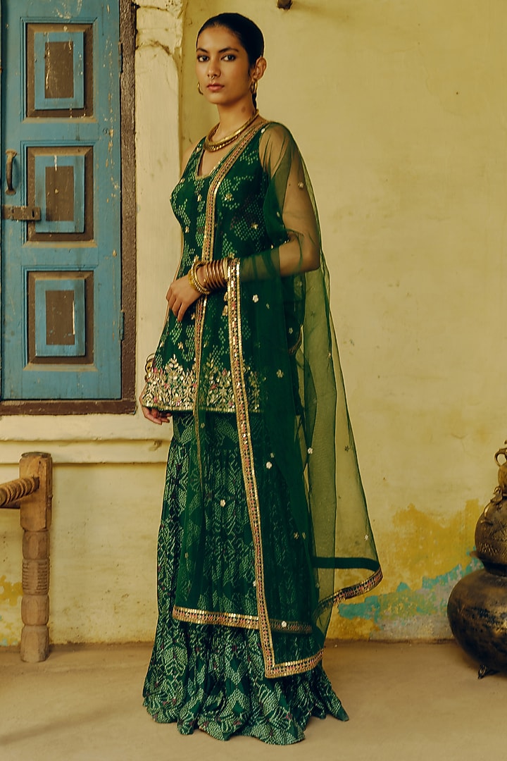 Emerald Green Dupion Silk Bandhani Printed & Hand Embroidered Party Wear Sharara Set by Drishti & Zahabia at Pernia's Pop Up Shop