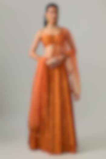 Rust Orange Dupion Silk Mirror & Zari Embroidered Lehenga Set by Drishti & Zahabia at Pernia's Pop Up Shop