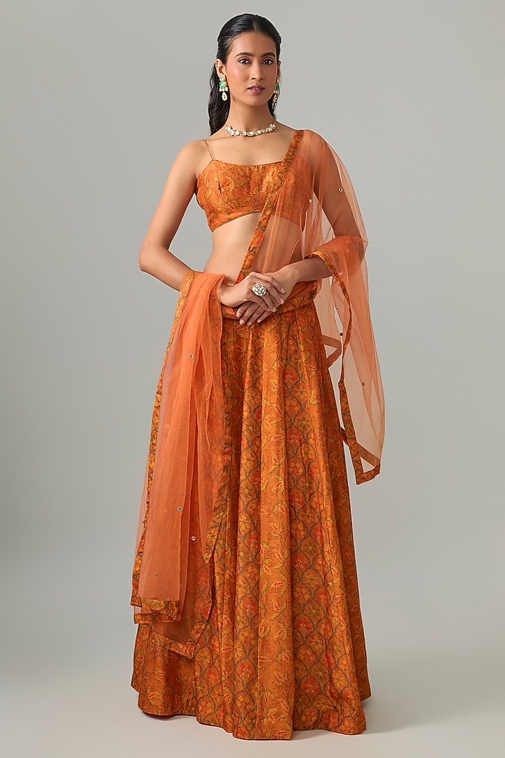 Rust Orange Dupion Silk Mirror & Zari Embroidered Lehenga Set by Drishti & Zahabia at Pernia's Pop Up Shop