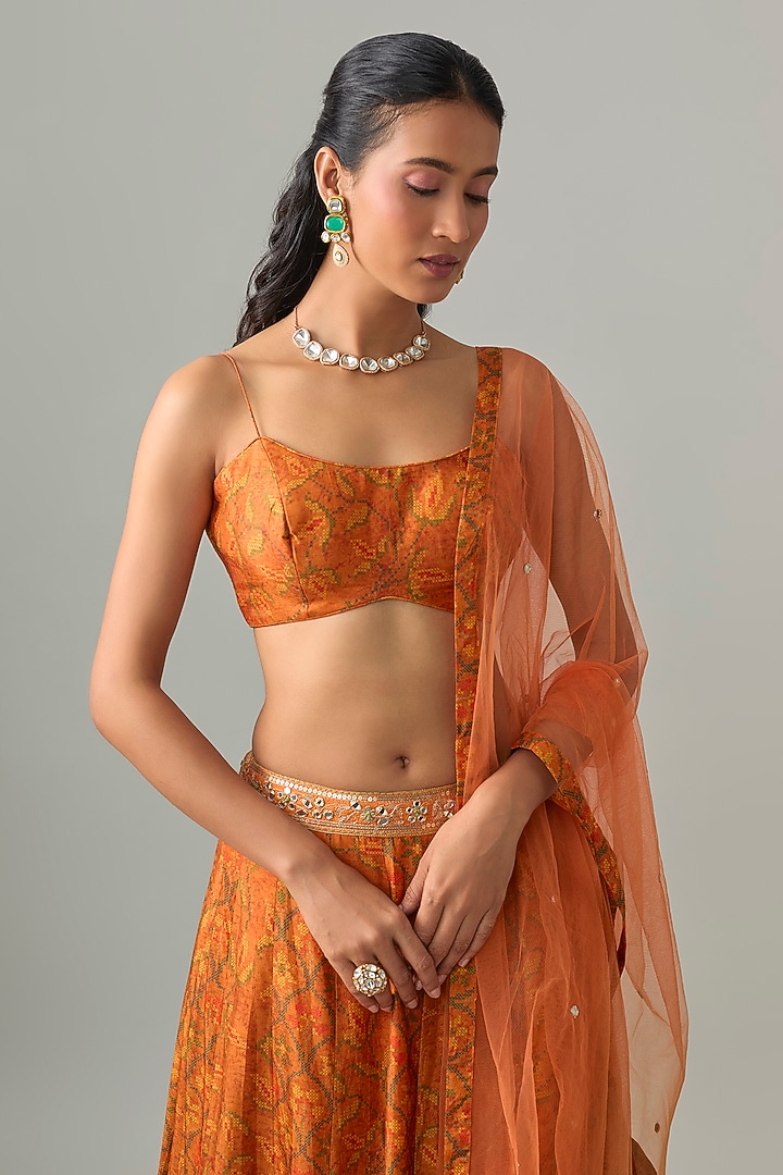 Rust Orange Dupion Silk Mirror & Zari Embroidered Lehenga Set by Drishti & Zahabia at Pernia's Pop Up Shop