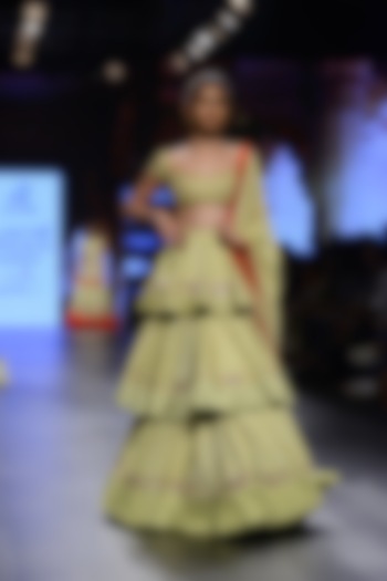 Pista green embroidered three tier lehenga set available only at Pernia's Pop Up Shop.