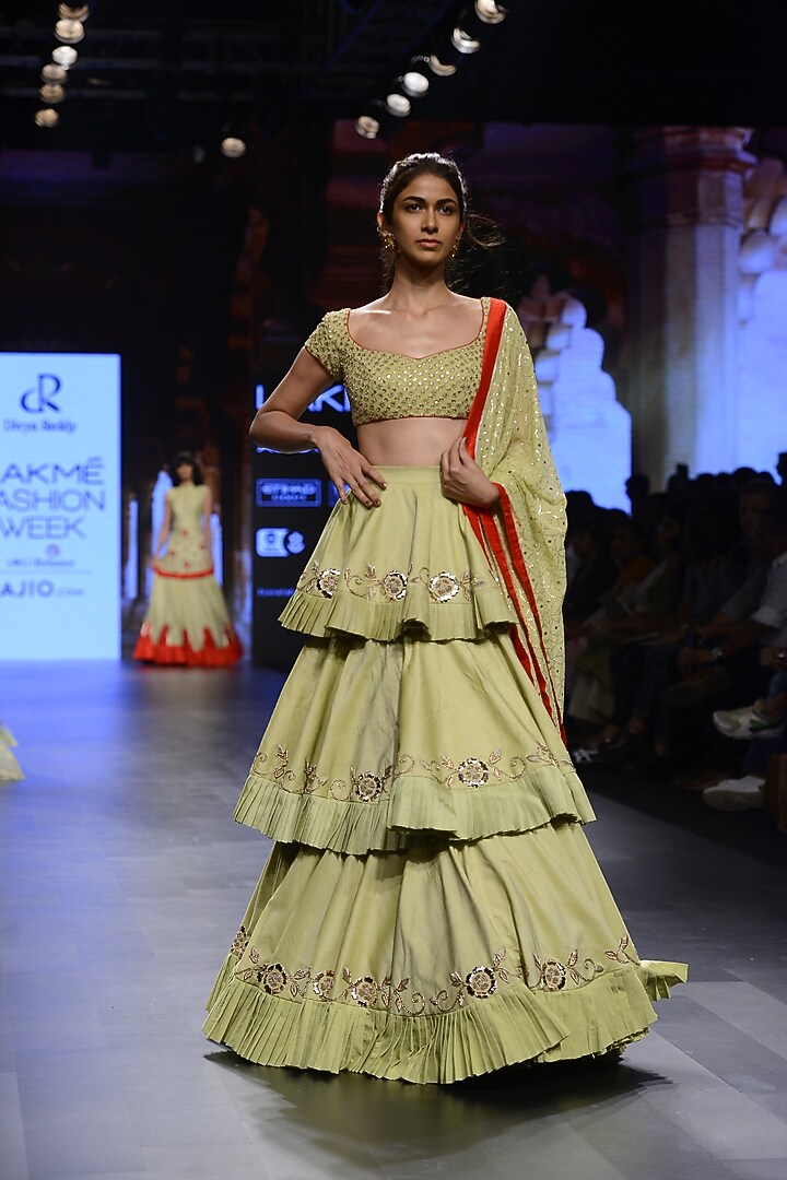 Pista green embroidered three tier lehenga set available only at Pernia's Pop Up Shop.