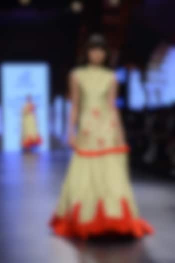 Pista green and orange embroidered kurta and lehenga set available only at Pernia's Pop Up Shop.