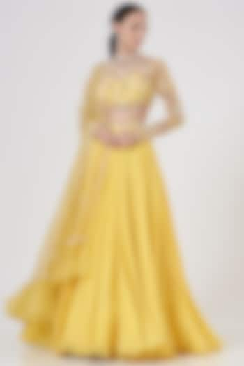 Yellow Hand Embroidered Lehenga Set by Dheeru Taneja