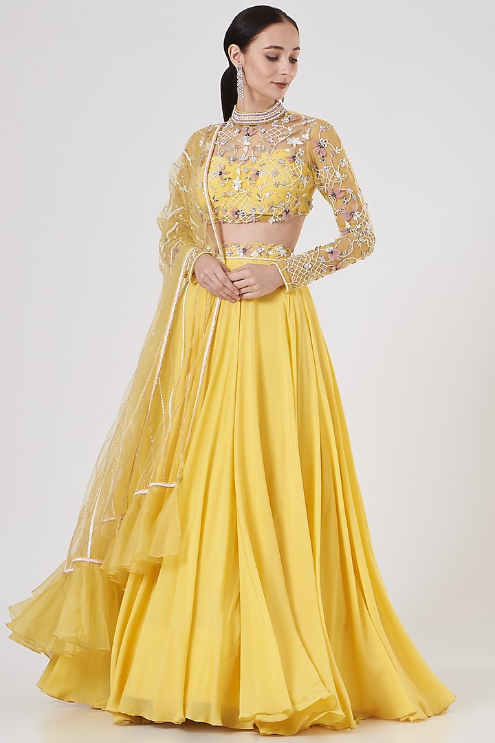 Yellow Hand Embroidered Lehenga Set by Dheeru Taneja