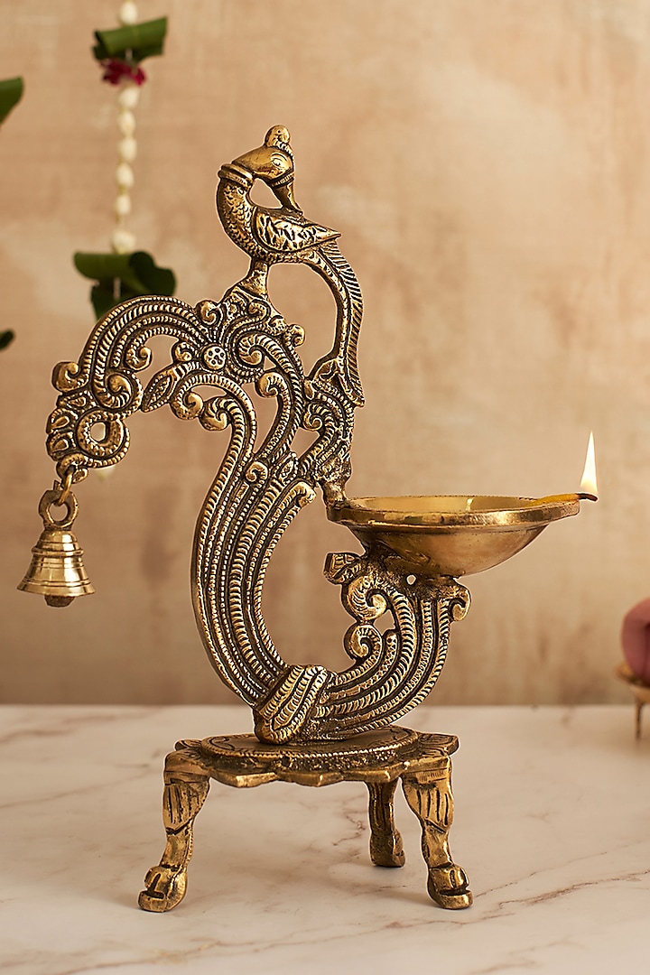 Gold Brass Peacock Diya by DecorTwist at Pernia's Pop Up Shop