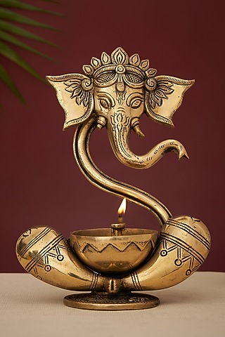 Gold Brass Lord Ganesha Idol With Akhand Diya by DecorTwist
