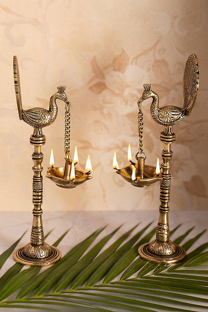 Golden Brass Peacock Hanging Diya by DecorTwist at Pernia's Pop Up Shop